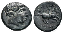 KINGS OF MACEDON. Philip III Arrhidaios. (323-317 BC). Ae. Miletos

Obv: Diademed head right
Rev: Horseman riding right; labrys above. monogram bel...