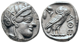Attica. Athens AR Tetradrachm. Circa 350-294 BC. Helmeted head of Athena right. c/m on cheek / Owl standing right. head facing; olive sprig and cresce...