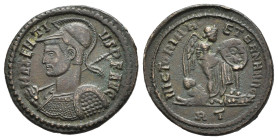 MASSENZIO (307-312). Mezzo Follis per Roma. AE (g 3,50). Busto elmato e corazzato a sinistra, con scudo e lancia. R/ Vittoria stante a destra, piede s...