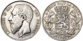 BELGIQUE, Royaume, Léopold II (1865-1909), AR 5 francs, 1867. F. avec point. Grande tête et signature le long du cou. Bogaert 1074B. Rare Nettoyé.
pr...