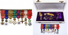 lot de 15 miniatures: une barrette de 8 décorations avec rubans, croix de guerre 1940 avec palme, grand-croix des Ordres d’Adolphe de Nassau, de la Co...