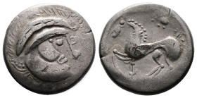South Danube Celtic Tribe, Silver Plated Tetradrachm (23,24 mm, 10.39). Eingesetzter Pferdefuß Type. Circa 3rd Century BC. Celticised, laureate and be...