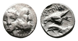 Moesia, Istros. 4th Century BC. Silver Obol (7.77 mm, 0.42 g.). Two facing heads side by side, one reverted. Rev. IΣTPIH, bird holding dolphin with cl...