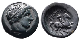 Kings of Macedon, Philip II, 359-336 BC. Bronze (18 mm, 5,64 g.). Uncertain mint in Macedonia. Diademed head of Apollo to right. Rev. ΦΙΛΙΠΠΟΥ Youth o...