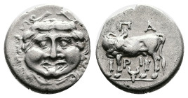 Mysia. Parion, 4th century BC. Silver Hemidrachm (13.88 mm, 2.36 g). Facing gorgoneion. Rev. ПA - PI, Cow standing left, head right; bull's head below...