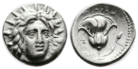 Ιslands off Caria, Rhodes, 250-230 BC. Silver Didrachm (19.5 mm, 6.54 g.). Radiate head of Helios facing slightly right. Reverse: ΡΟΔΙΟΝ, Rose with bu...