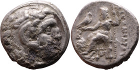 Alexander III (336-323 BC) Silver coin Obverse: Head of Herakles to right, wearing lion skin headdress Rev: Zeus seated left on low throne, holding lo...