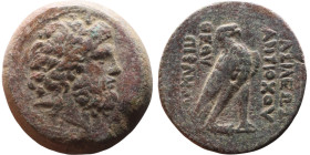Antiochos IV Epiphanes (Seleukid King: 175-164 BC). AE bronze. Obverse: Laureate head of Zeus right Reverse: Eagle standing right on thunderbolt

35...