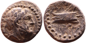 Phoenicia Arados (II Century BC) Bronze coin. Obverse: Diademed head of Poseidon right Reverse: Stern or ram of galley, unclear date below.

15mm 2,...