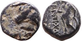 Seleukos IV Filopator (Seleukid King: 187 – 175 BC) AE bronze. Obv:Diademed head of Seleucus IV right Reverse: Apollo standing left, testing arrow and...