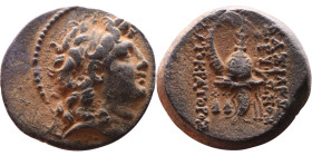 Tryphon (Seleukid King: 142-138 BC). AE bronze. Obv.: diademed bust of Tryphonos right. Rev.:ΒΑΣΙΛΕΩΣ ΤΡΥΦΩΝΟΣ (AY)ΤΟΚΡΑΤΟΡΟΣ, macedonian helmet decor...