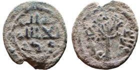 Umayyad/Abbasid. Bronze coin. Obverse: Arabic inscription. Reverse: Arabic inscription

18mm 2,30g