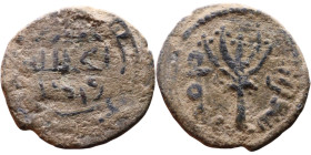 Umayyad/Abbasid. Bronze coin. Obverse: Arabic inscription. Reverse: Arabic inscription

20mm 2,36g
