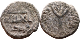 Umayyad/Abbasid. Bronze coin. Obverse: Arabic inscription. Reverse: Arabic inscription

16mm 2,19g