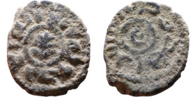 Umayyad/Abbasid. Bronze coin. Obverse: Arabic inscription. Reverse: Arabic inscription

14mm 2,46g