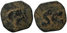 Uncertain.
AE Bronze (13mm, 0,74g)
Obv: Male head to right.
Rev. S C