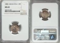 Republic 10 Centavos 1882 MS65 NGC, KM26. Turquoise, gold and rose pastel coloring enveloping this popular and attractive type. 

HID09801242017