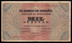 1.000 pesetas. 1938. Burgos. (Ed-434). 20 de mayo, cuadro "Defensa del púlpito de San Agustín". Serie A. Dobleces y roturas en los margenes. Raro. BC+...