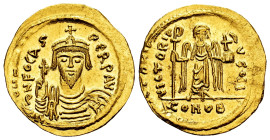 Phocas. Solidus. 609-610 AD. Constantinople. (MIBE-11). (Doc-10j). (Sear-620). Anv.: ∂ N FOCAS PЄRP AVG, draped and cuirassed bust facing, wearing cro...