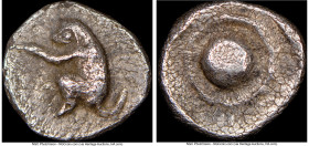 THRACO-MACEDONIAN REGION. Uncertain mint. 5th century BC. AR tetartemorion (6mm, 0.23 gm). NGC XF 5/5 - 3/5. Primate crouching left / Pellet or shield...
