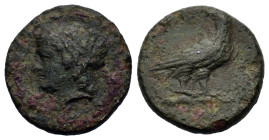 Sicily, Akragas. Tyranny of Phintias, c. 287-279 BC. Æ Onkia (15mm,2.9g). Laureate head of Apollo to l. R/ Eagle standing to r., head reverted. CNS I,...