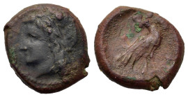 Sicily, Akragas. Tyranny of Phintias, c. 287-279 BC. Æ Onkia (13.3mm,3g). Laureate head of Apollo to l. R/ Eagle standing to r., head reverted. CNS I,...