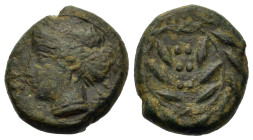 Sicily, Himera, c. 415-409 BC. Æ Hemilitron (15.3mm,4.3g). Head of nymph l., hair bound in ampyx and sphendone; six pellets before. R/ Six pellets wit...