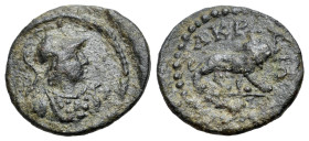 Time of Septimius Severus (193-211). Lydia, Acrasus. Pseudo-autonomous issue. Æ (15mm, 1.24g, 6h). Helmeted bust of Athena r., wearing aegis. R/ Lion ...