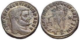 Diocletian (284-305). Æ Nummus (27mm, 9.72g, 6h). Rome. Laureate head r. R/Moneta standing l., holding scales and cornucopia; star to r. RP in exergue...