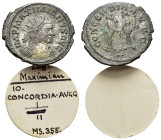 Maximianus (286-305). Radiate (23mm, 4.63g). Lugdunum, 294. Radiate, draped and cuirassed bust r. R/ Two Concordiae standing facing each other, holdin...
