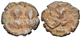 Justin I and Justinian I, Antioch AD 522. 40, 20, 10. 10 o 5 Nummi ? (19mm, 2.16g, 10h). D N IVSTIN ET IVSTINIANVS PP AVG, two facing busts, cross abo...