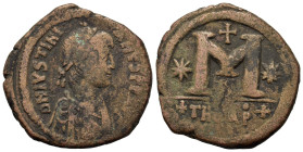 Justinian I (527-565). Æ Follis (31.9mm14.3g). Theoupolis (Antiochia), 533-537. Diademed, draped, and cuirassed bust of Justinian I to r. R/ Large M b...