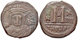Maurice Tiberius (582-602). Æ 40 Nummi (26mm, 10.53g, 6h). Theoupolis (Antioch), year 18 (599/600). Crowned facing bust, wearing consular robes, holdi...
