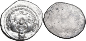 Greek Italy. Etruria, Populonia. AR 10 Units. First Metus Group, c. 425-400 BC. Obv. Head of Metus facing, hair bound with diadem; below, X. Rev. Blan...