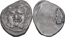 Greek Italy. Etruria, Populonia. AR 20 Asses, c. 3rd century BC. Obv. Head of Metus facing, hair bound with diadem; below, oX:Xo. Rev. Blank. Vecchi E...