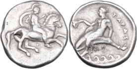 Greek Italy. Southern Apulia, Tarentum. AR Nomos, c. 344-340 BC. Obv. Warrior on horseback right, shield on left shoulder; below, T. Rev. Taras seated...