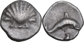 Greek Italy. Southern Apulia, Tarentum. AR Hemilitron, 325-280 BC. Obv. Scallop shell. Rev. Dolphin right; below, grape bunch. HN Italy 980; HGC 1 865...