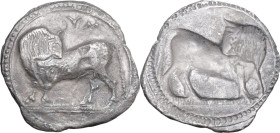 Greek Italy. Southern Lucania, Sybaris. AR Stater, 550-510 BC. Obv. Bull standing left on dotted ground line, head turned back; above, YM. Rev. Incuse...