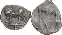 Greek Italy. Southern Lucania, Sybaris. AR Obol, 550-510 BC. Obv. Bull standing left, head right; V M in exergue. Rev. Large M/V; four pellets around....