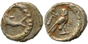 PHOENICIA. Tyre. Circa 393-311/0 BC. Obol (silver, 0.50 g, 7 mm). Dolphin to right. Rev. Owl standing to right, head facing. Very fine.