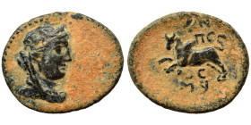 PHOENICIA. Arados. Ae (bronze, 6.18 g, 25 mm). Diademed and draped bust of Astarte to right. Rev. Humped bull leaping left; monograms above and below....