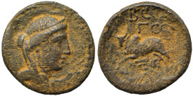 PHOENICIA. Arados. Ae (bronze, 4.62 g, 20 mm). Diademed and draped bust of Astarte to right. Rev. Humped bull leaping left; monograms above and below....