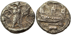 PHOENICIA. Sidon. Time of Ba'alšillem I-Ba'ana, circa 425-401 BC. 1/16 Shekel (silver, 0.71 g, 7 mm). The Persian Great King standing right, drawing b...