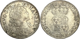 Écu de Navarre ou Westphalien, Rouen 1718.
Argent. 24,41g. Stries d'ajustage. Très Beau à Superbe. A/. Buste enfantin du Roi à droite, lauré, drapé e...