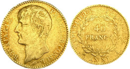 CONSULAT (1799-1804). 40 francs or Bonaparte, Paris An XI.
Or. 12,85g. TB. A/. Tête nue du Premier Consul à gauche, signature de Tiolier au-dessous. ...