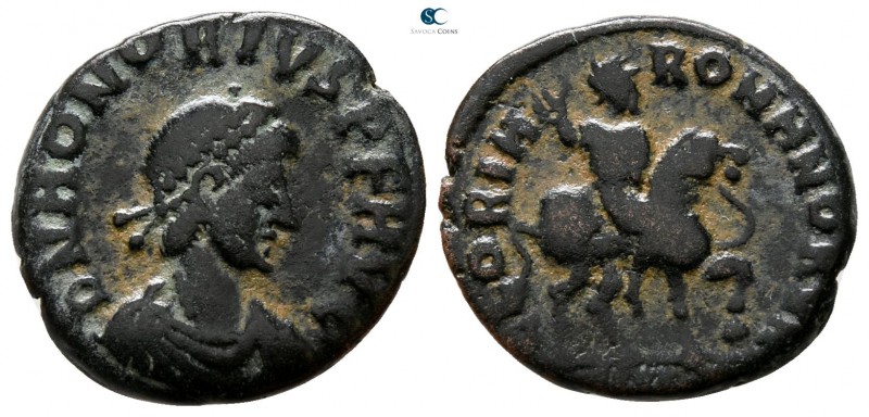 Honorius AD 393-423. Uncertain mint
Follis Æ

15 mm., 2.06 g.



nearly v...