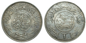 SAUDI ARABIA - Kingdom

Saud bin Abdulaziz (1953 - 1964)

1 Riyal

OBVERSE : 'ملك المملكة العربية السعودية /سعود بن عبد العزيز آل سعود two palm ...