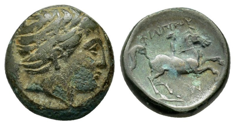 KINGS of MACEDON. Philipp II.(359-336). Ae.

Obv : Diademed head of Apollo right...