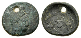 BITHYNIA.Kios.(3rd century BC).Ae.

Obv : Head of Mithras right, wearing a laureate tiara.

Rev : K-I.
Kantharos with two grape vines within wreath of...