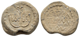 BYZANTINE LEAD SEAL.(Circa 7th-11th Century).Pb.

Condition : Good very fine.

Material : Lead.
Axis : 12h.

Weight : 13.73 gr.
Diameter : 22 mm.